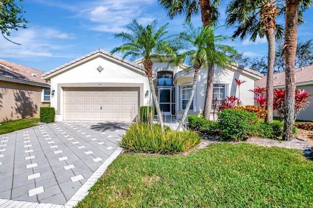 view of front of property with a garage