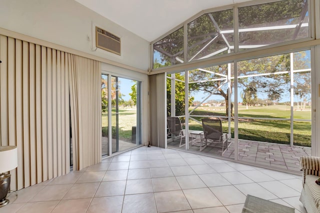 unfurnished sunroom with a wall unit AC