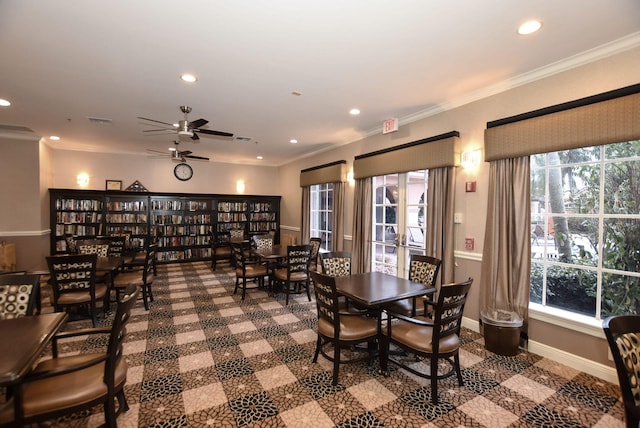 dining room with ceiling fan and ornamental molding