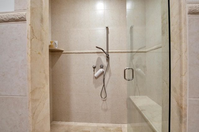 bathroom featuring an enclosed shower