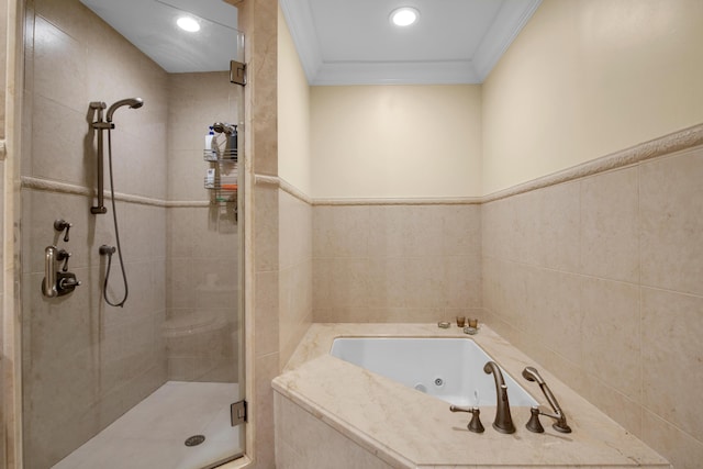 bathroom featuring crown molding and independent shower and bath