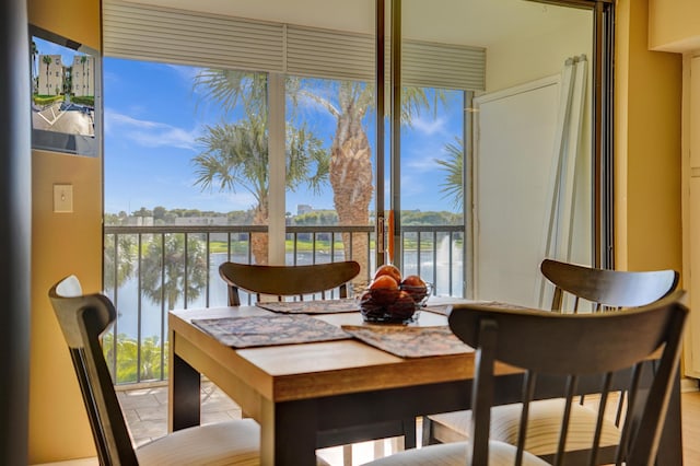 dining room with a water view