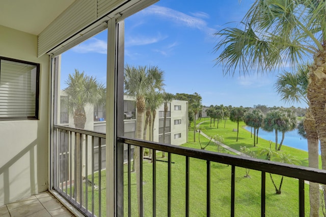 balcony featuring a water view