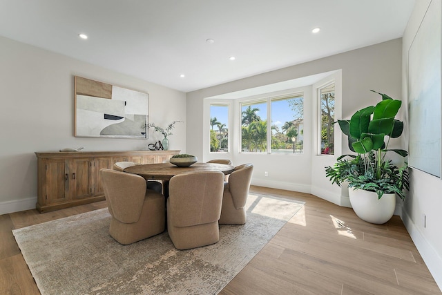 dining room featuring light hardwood / wood-style flooring