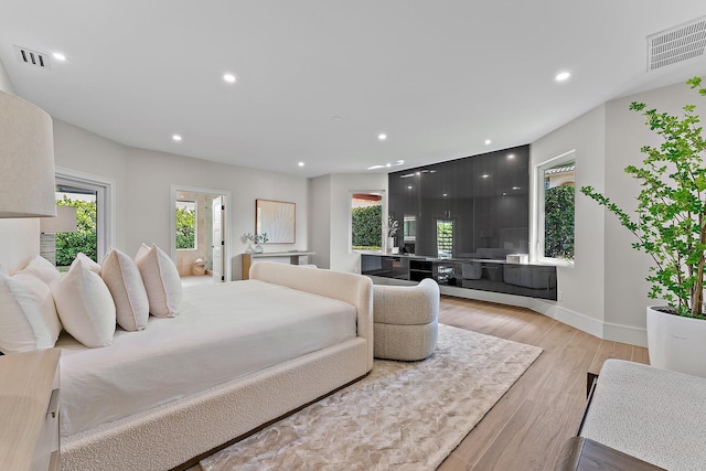 bedroom featuring light hardwood / wood-style floors