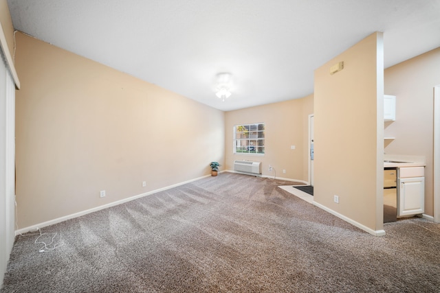 unfurnished living room with carpet flooring