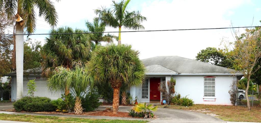 ranch-style home with a garage