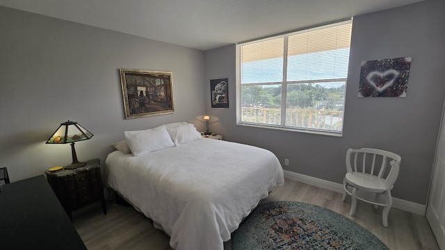 bedroom featuring light hardwood / wood-style flooring