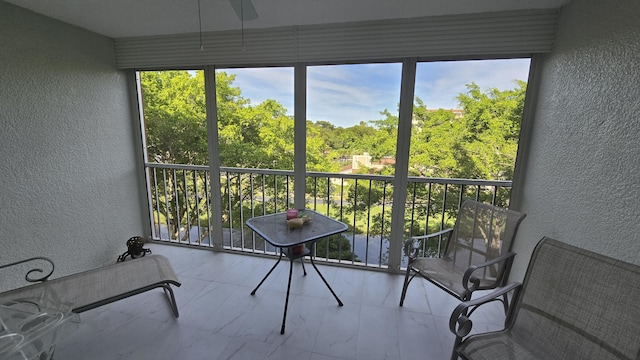 sunroom / solarium with a healthy amount of sunlight