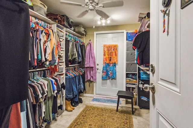 spacious closet with ceiling fan