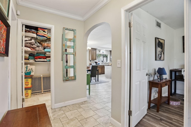 corridor with crown molding