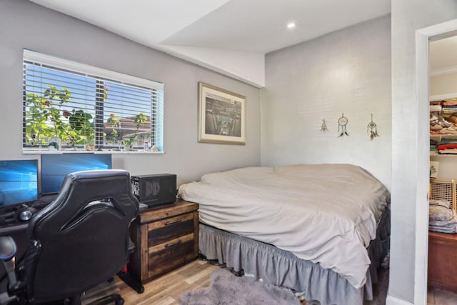 bedroom with light hardwood / wood-style flooring