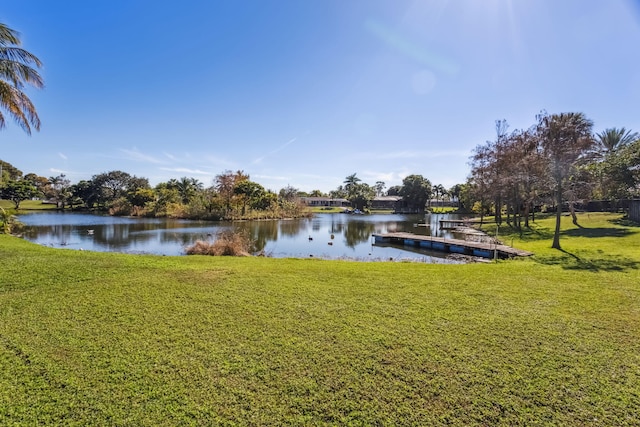 view of water feature with a dock