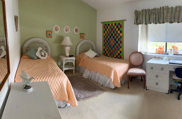 bedroom with light colored carpet