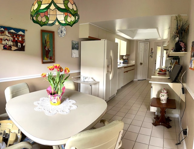 view of tiled dining area