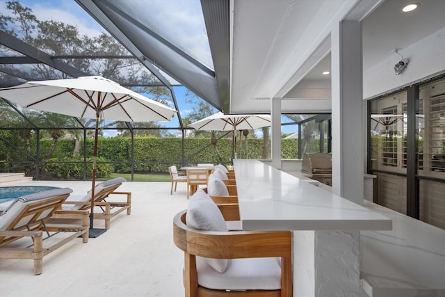 view of patio featuring a swimming pool, a grill, and glass enclosure