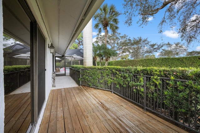 deck featuring glass enclosure