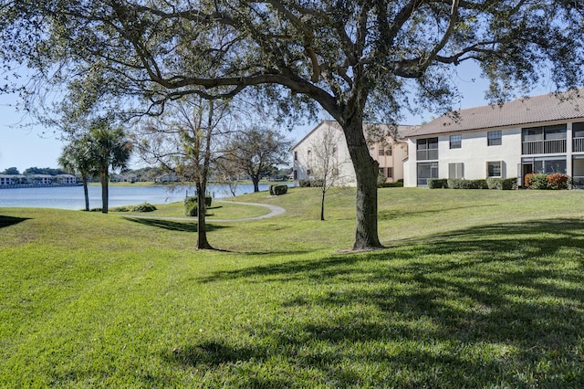 view of yard with a water view