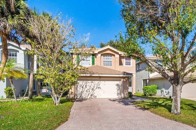 front of property with a garage and a front yard