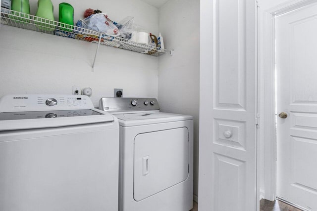 laundry area with washer and clothes dryer