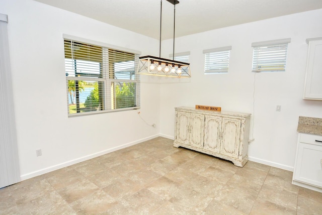 view of unfurnished dining area