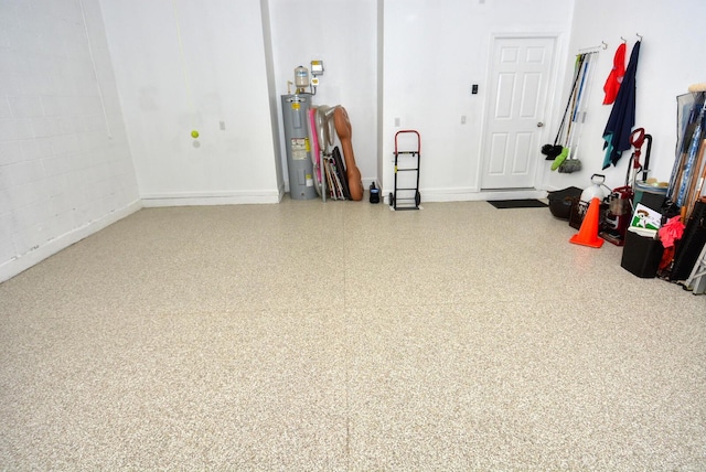 garage featuring water heater