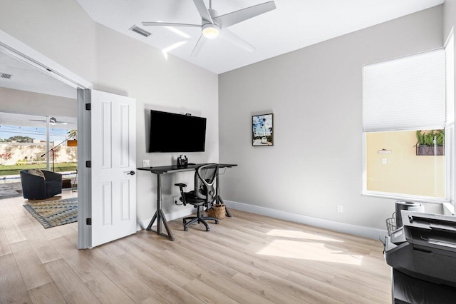 office space with ceiling fan and light hardwood / wood-style flooring