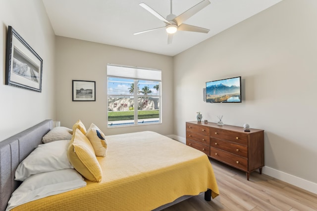 bedroom featuring light hardwood / wood-style flooring and ceiling fan