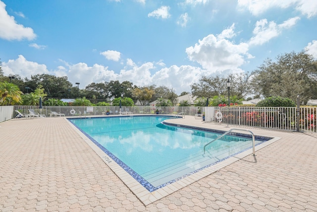 view of pool featuring a patio area