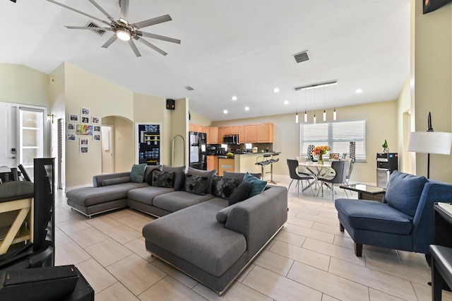 living room with track lighting and ceiling fan