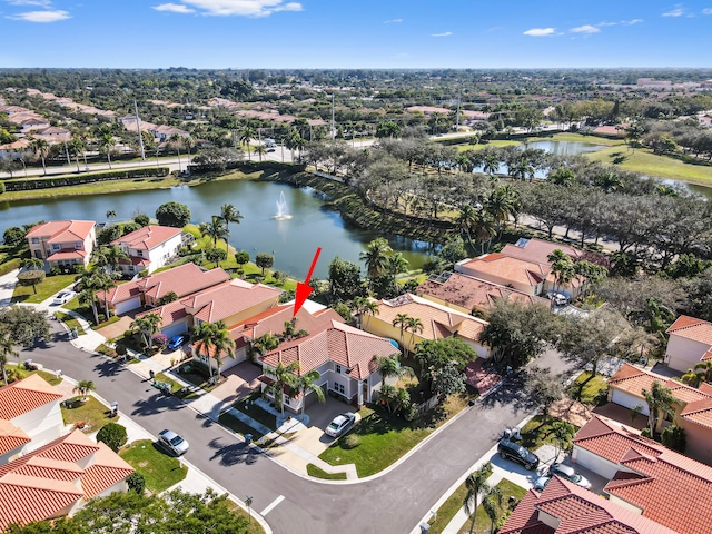 drone / aerial view with a water view