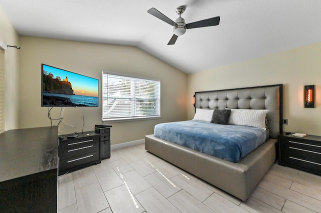 bedroom with vaulted ceiling and ceiling fan