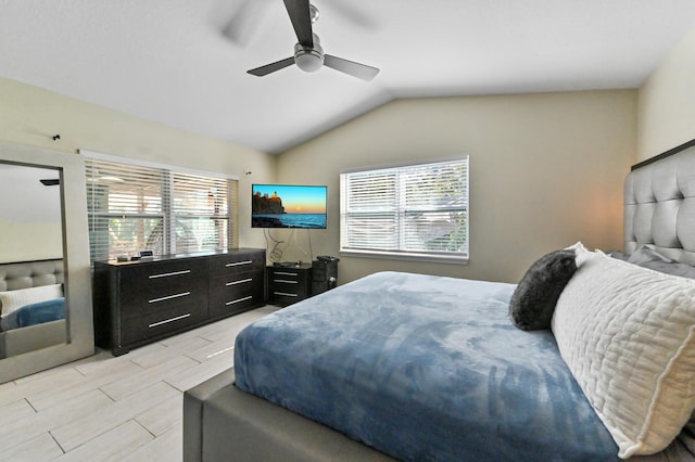 bedroom with ceiling fan and vaulted ceiling