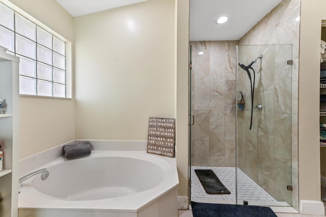 bathroom with independent shower and bath