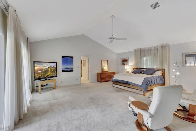 carpeted bedroom featuring multiple windows, vaulted ceiling, and ceiling fan