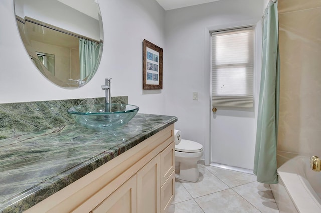 full bathroom featuring tile patterned flooring, vanity, shower / tub combo, and toilet