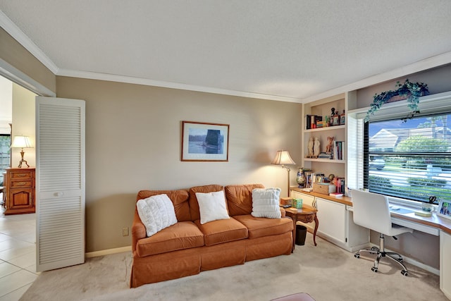 home office featuring light carpet, built in shelves, a textured ceiling, and ornamental molding