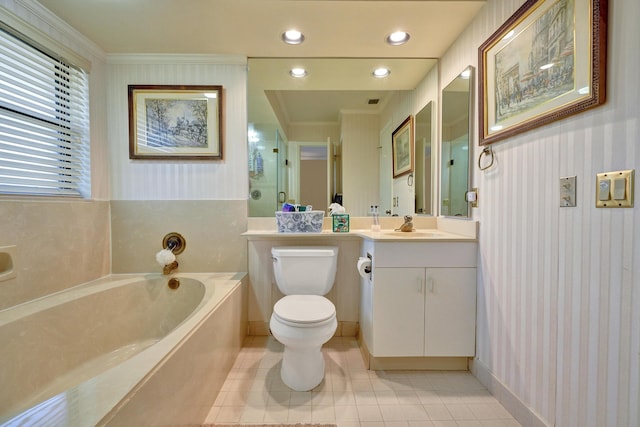 bathroom featuring ornamental molding, vanity, tile patterned flooring, toilet, and a tub