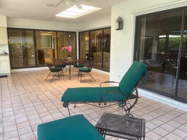17001 Freshwind Cir, Jupiter, FL 33477 - view of patio featuring outdoor dining area