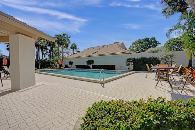 17001 Freshwind Cir, Jupiter, FL 33477 - community pool with a patio area