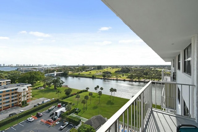 balcony featuring a water view