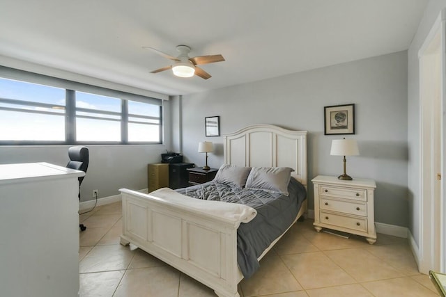 bedroom with light tile patterned floors and ceiling fan