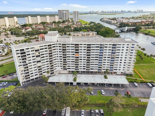 birds eye view of property featuring a water view