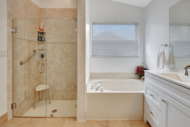 bathroom with tile patterned flooring, vanity, lofted ceiling, and shower with separate bathtub