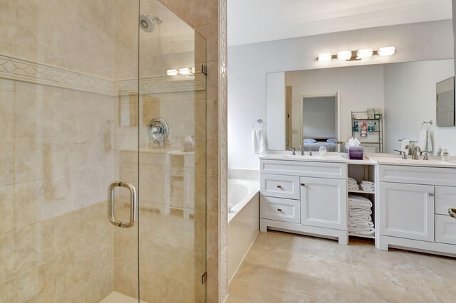 bathroom featuring vanity and plus walk in shower