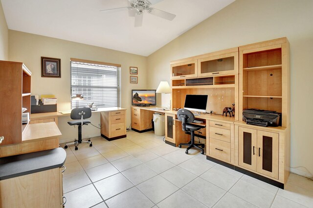 tiled home office featuring ceiling fan and vaulted ceiling