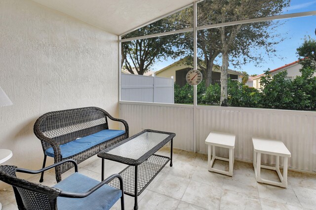 sunroom with lofted ceiling