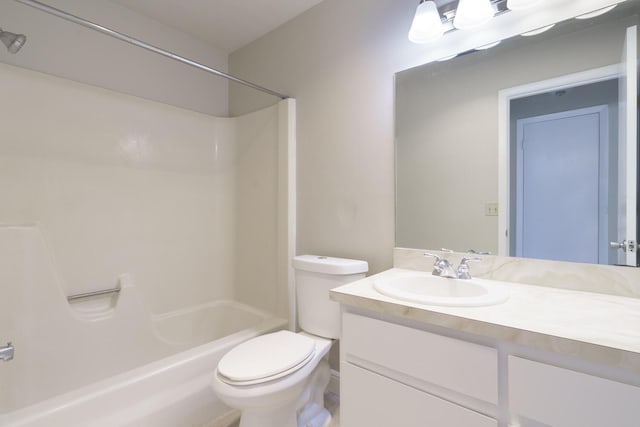 full bathroom with vanity, bathtub / shower combination, and toilet