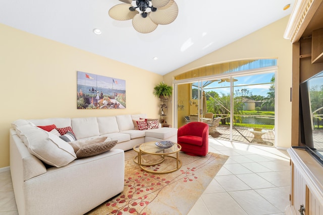 tiled living room featuring lofted ceiling and ceiling fan