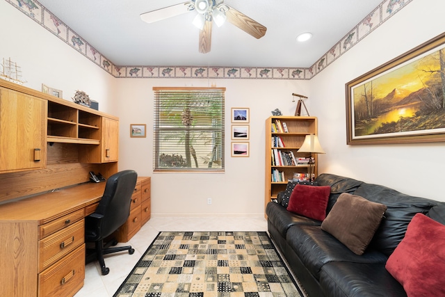 home office with light tile patterned flooring and ceiling fan